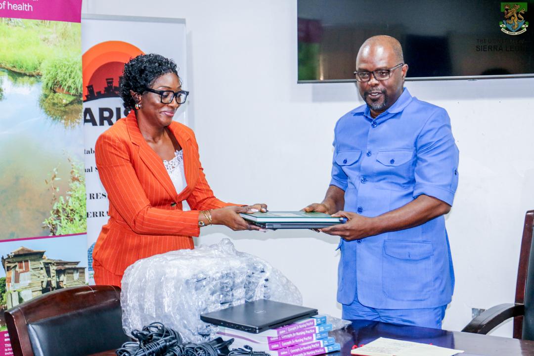 The Sir Juma Jalloh Foundation Donates Cartoons of Medical Textbooks and 10 Laptops to COMAHS
